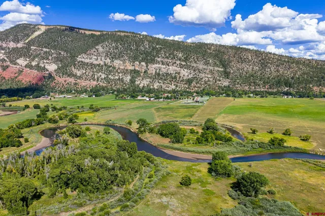 a view of a city with an ocean
