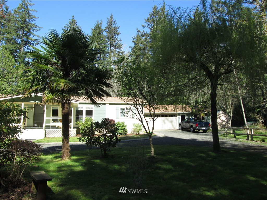 18905 Rouse Road Southwest Longbranch, WA 98351 - Photo 1 of 25 a view of house with yard
