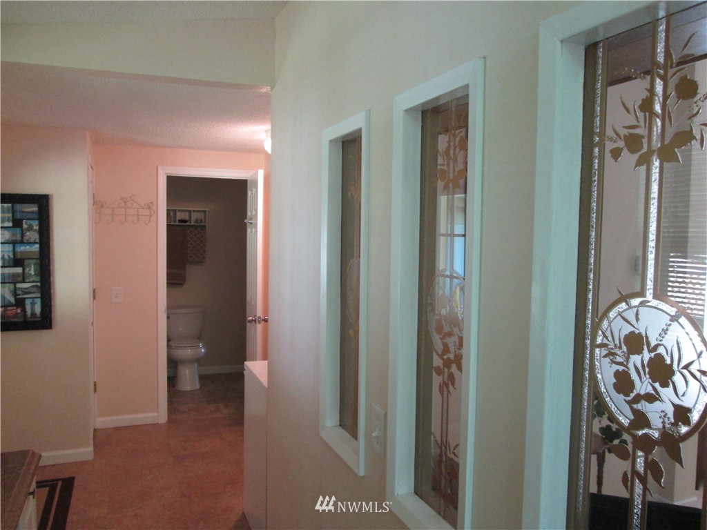 18905 Rouse Road Southwest Longbranch, WA 98351 - Photo 11 of 25 a view of a hallway with elevator