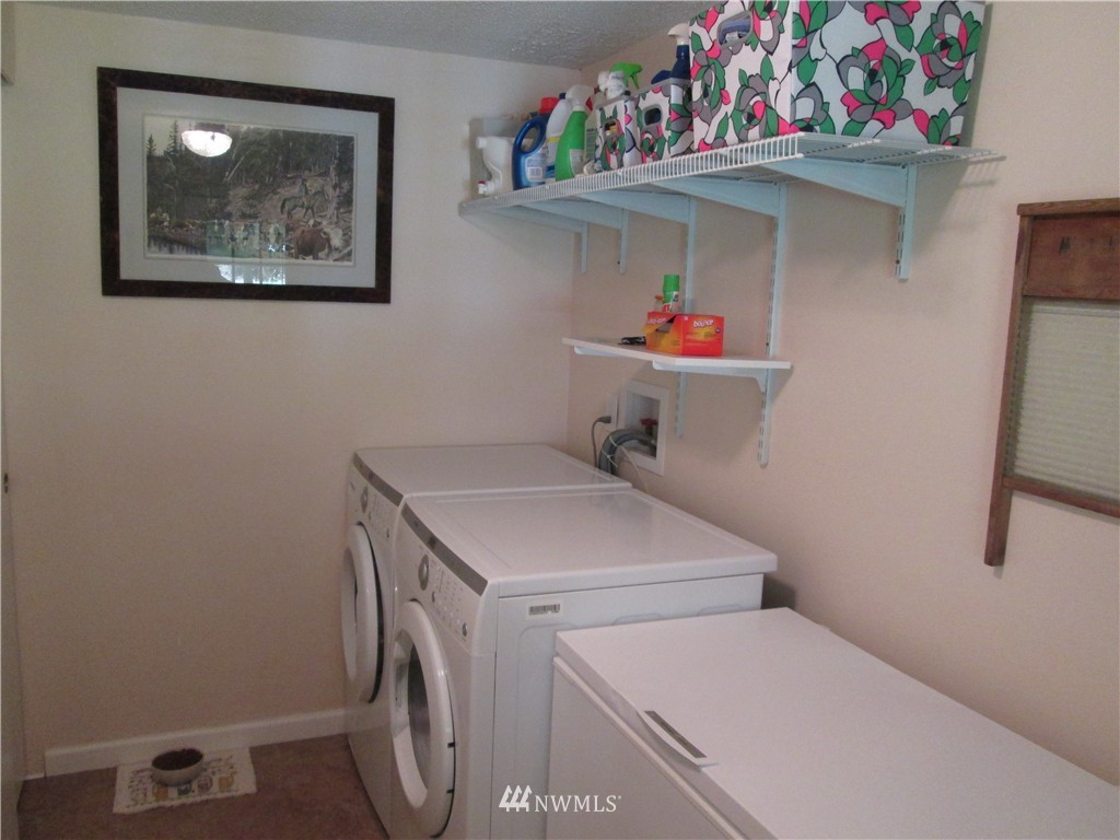 18905 Rouse Road Southwest Longbranch, WA 98351 - Photo 13 of 25 a utility room with dryer and washer