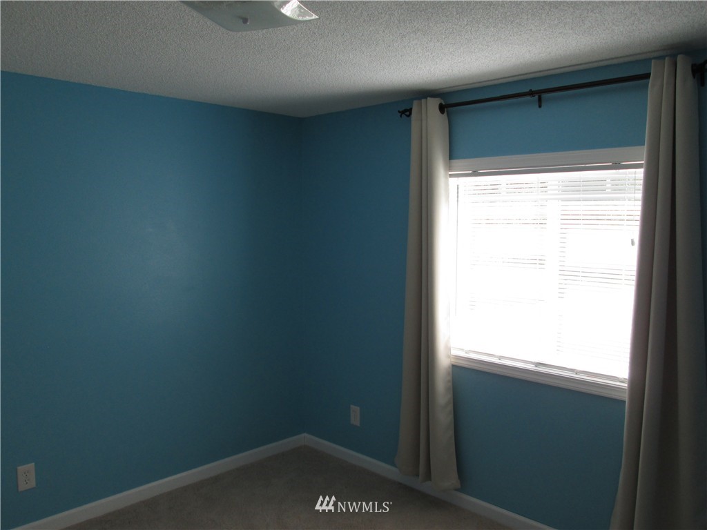 18905 Rouse Road Southwest Longbranch, WA 98351 - Photo 16 of 25 a view of an empty room