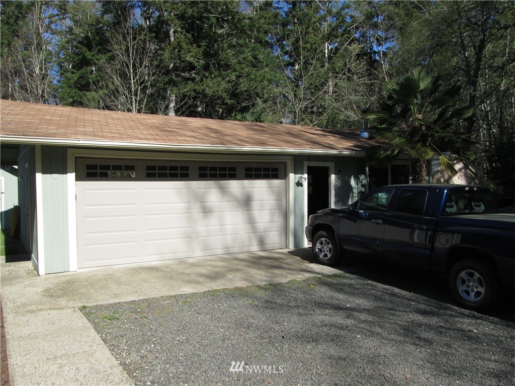 18905 Rouse Road Southwest Longbranch, WA 98351 - Photo 23 of 25 a view of a car in front of house