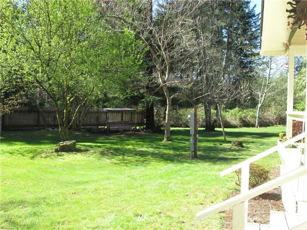 18905 Rouse Road Southwest Longbranch, WA 98351 - Photo 24 of 25 a view of a house with a yard