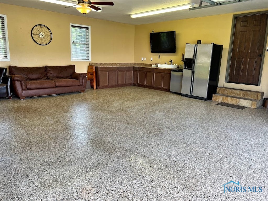 3525 Albon Road Maumee, OH 43537 - Photo 18 of 48 Custom stone steps, refrigerator/freezer, sink, built in storage, cabinets/countertops, ceiling fan included.