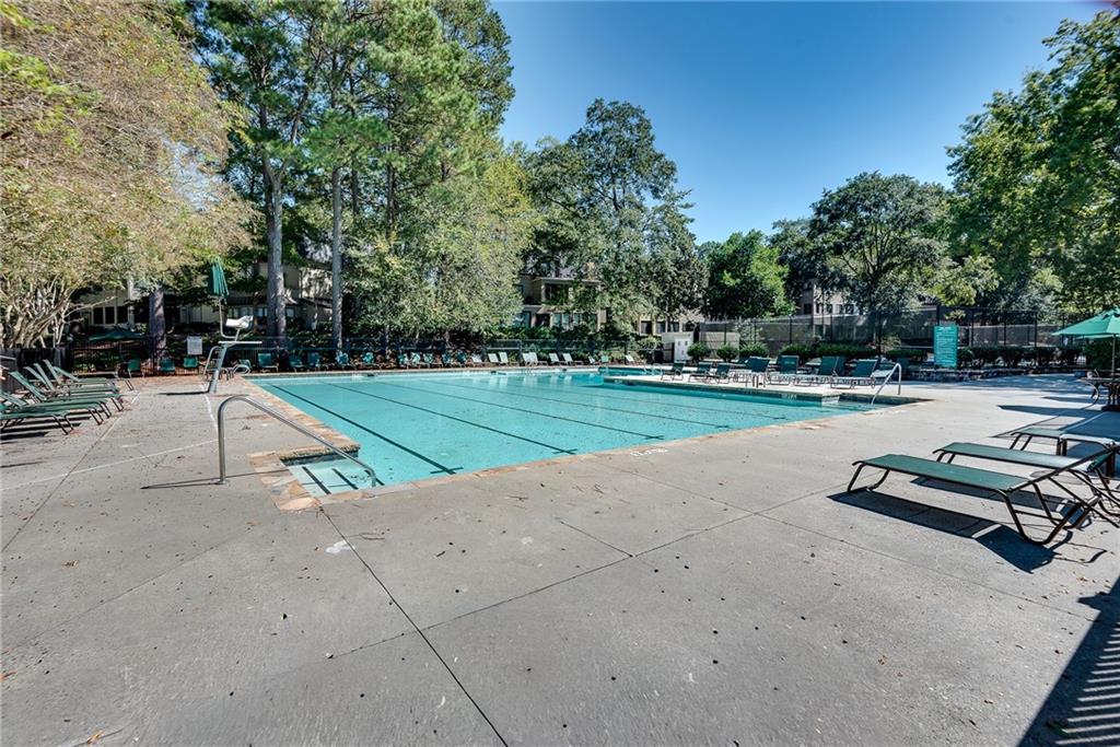 134 Lablanc Way Northwest Atlanta, GA 30327 - Photo 35 of 42 a view of a park with swings and slides