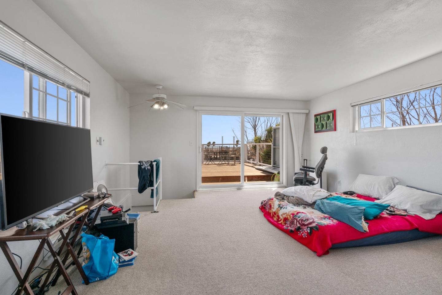 321 Second Street Santa Cruz, CA 95060 - Photo 16 of 34 a bedroom with furniture and a flat screen tv