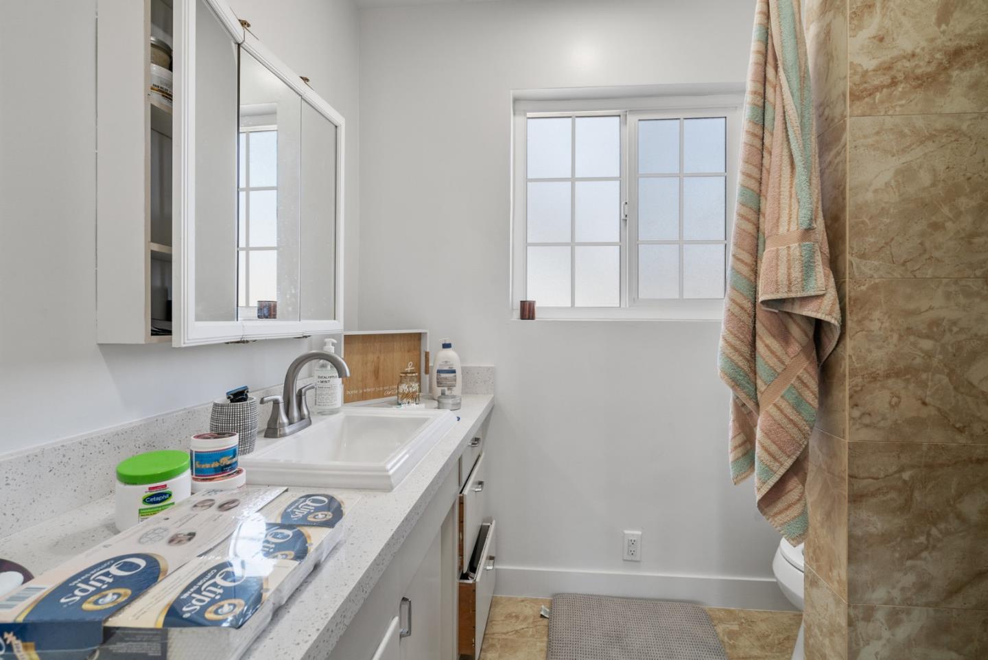 321 Second Street Santa Cruz, CA 95060 - Photo 17 of 34 a bathroom with a sink a vanity and a mirror