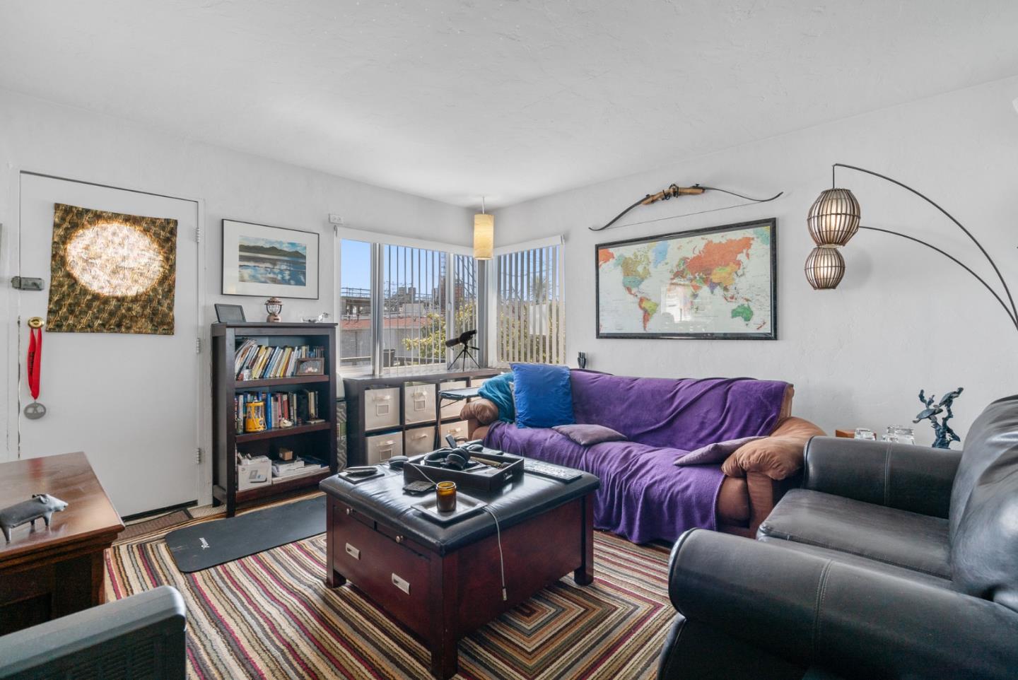 321 Second Street Santa Cruz, CA 95060 - Photo 20 of 34 a living room with furniture and painting on the wall