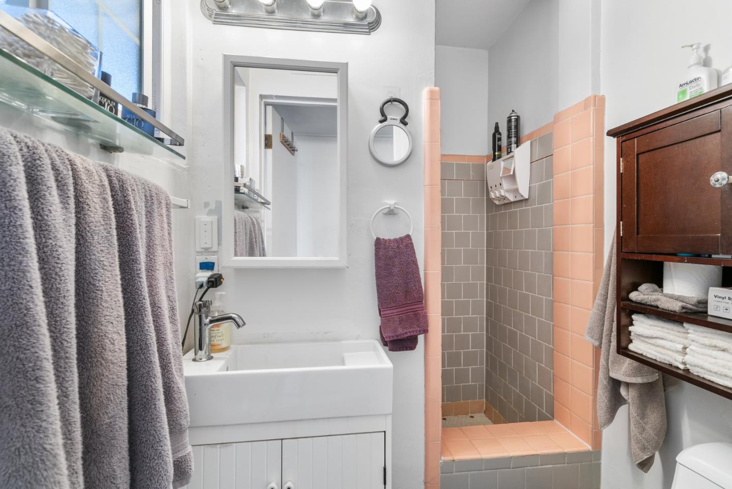 321 Second Street Santa Cruz, CA 95060 - Photo 23 of 34 a bathroom with a bathtub and a shower