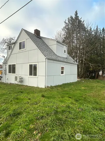a view of a backyard of house