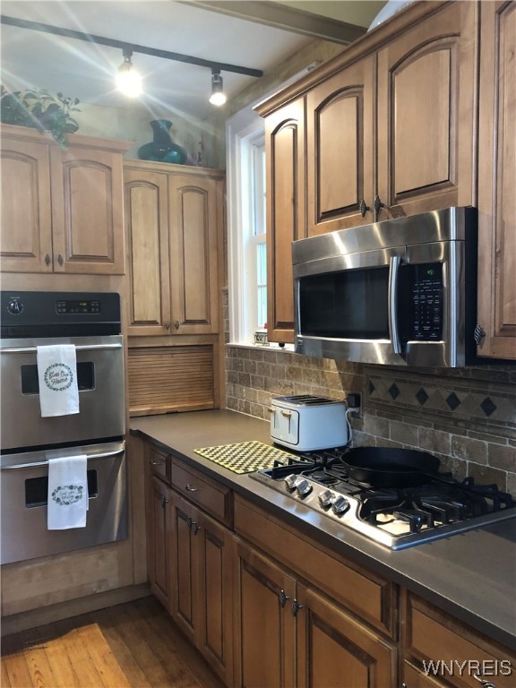 5079 Forest Road Lewiston, NY 14092 - Photo 12 of 50 EFFICENCY KITCHEN,
MAPLE CABINETS CABINETS/STORAG