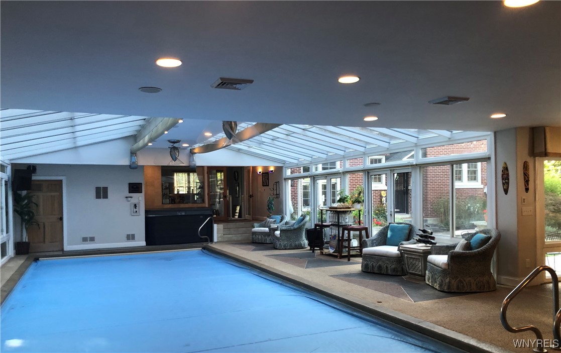 5079 Forest Road Lewiston, NY 14092 - Photo 22 of 50 POOL ROOM/CLIMATE CONTROLLED/HEATED POOL- BACK TO