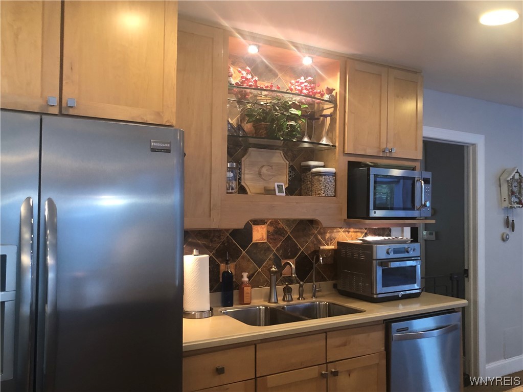 5079 Forest Road Lewiston, NY 14092 - Photo 26 of 50 LIGHT OAK CABINETS/HARD SURFACE COUNTERS