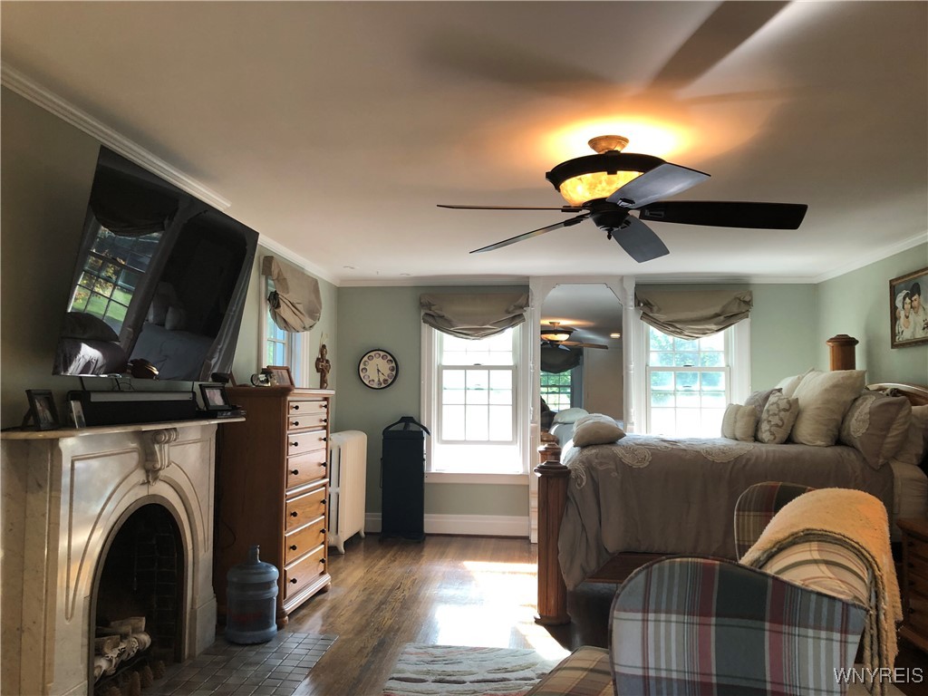 5079 Forest Road Lewiston, NY 14092 - Photo 31 of 50 PRIMARY BEDROOM -CROWN MOLDINGS