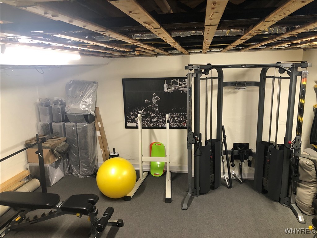 5079 Forest Road Lewiston, NY 14092 - Photo 43 of 50 WORK OUT AREA- CARPETED BSMT - 1/2 BATH