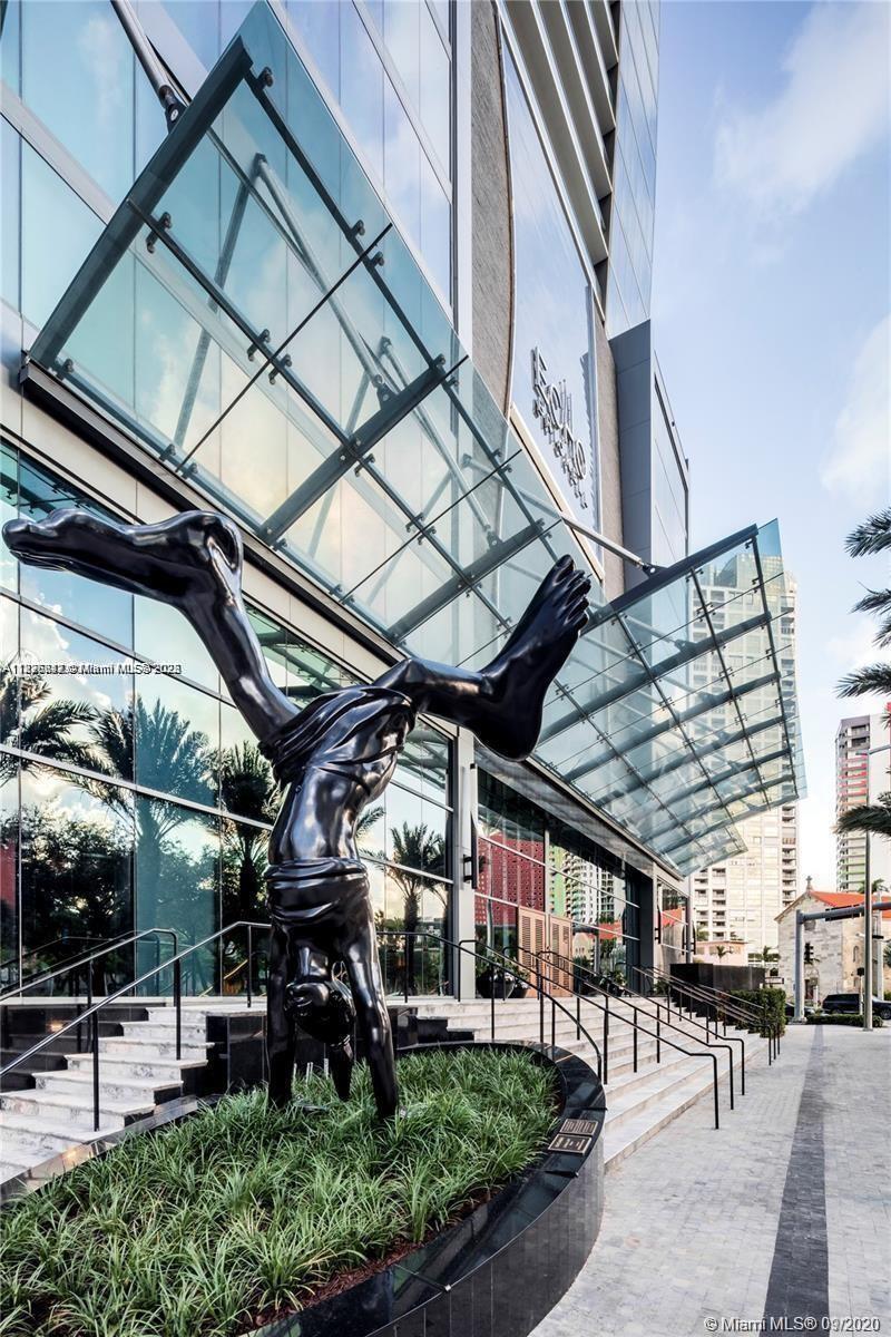 1451 Brickell Avenue, Unit 3102 Miami, FL 33131 - Photo 18 of 25 a view of a garage with wooden walls
