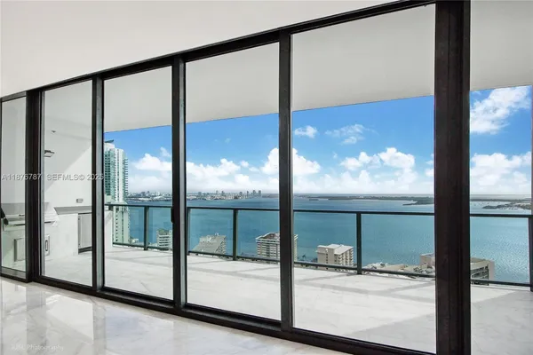 a view of balcony with furniture
