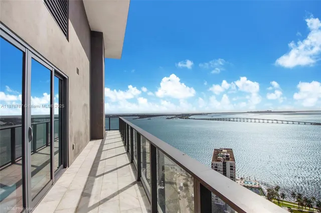 a view of balcony with furniture