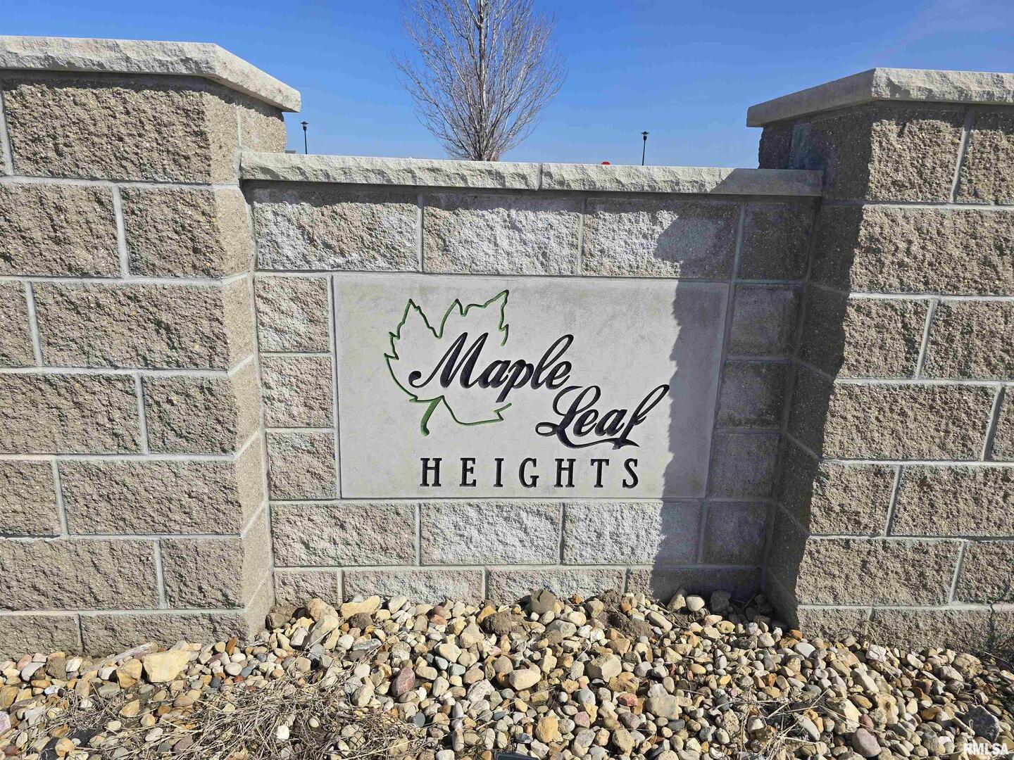 803 Darnall Drive Geneseo, IL 61254 - Photo 2 of 17 a sign on the side of a building