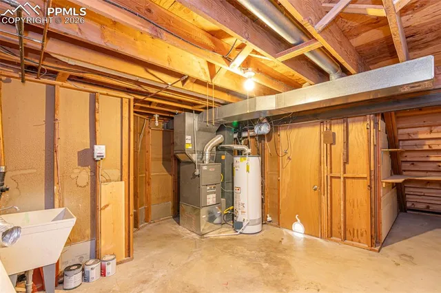 a view of outdoor space with deck and large trees