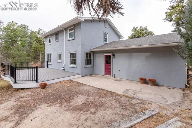 a house with trees in front of it