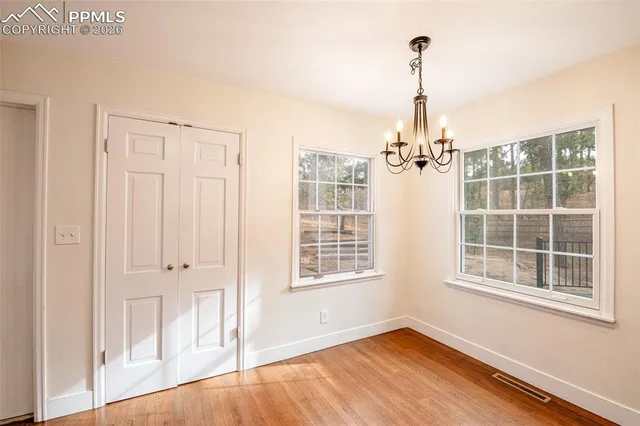 a view of empty room with windows