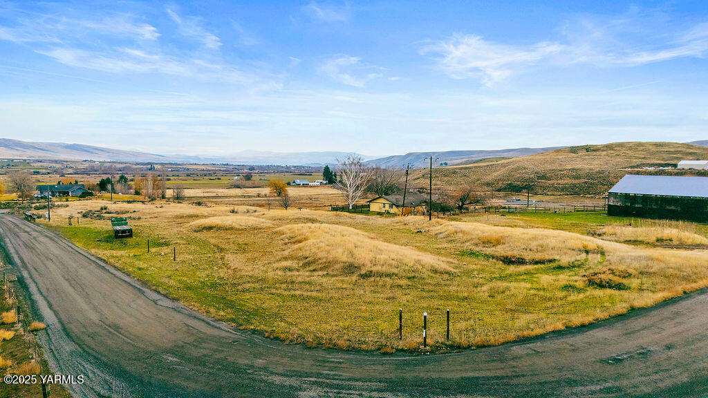 Nka Conrad Road Selah, WA 98942 - Photo 13 of 16 a view of a swimming pool with an ocean view