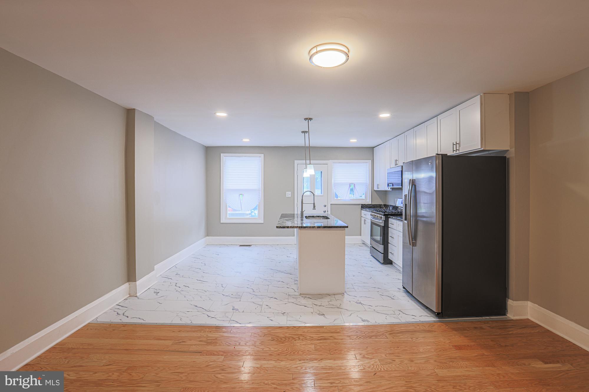 130 Reedbird Avenue Baltimore, MD 21225 - Photo 14 of 43 Dining area & kitchen
