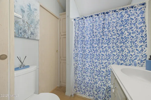 a bathroom with a toilet and a sink