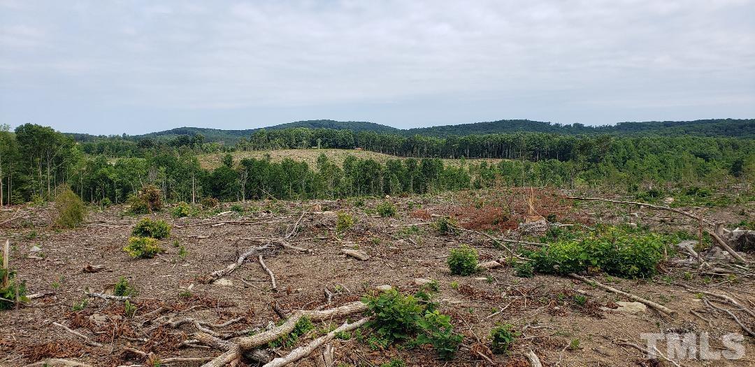 7100 Farmer Road Denton, NC 27239 - Photo 3 of 4 a view of a lake with a city