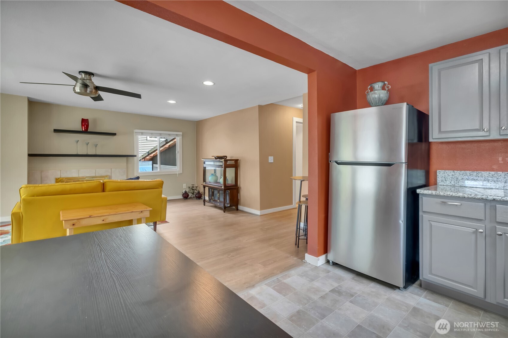 2307 Southwest Myrtle Street Seattle, WA 98106 - Photo 12 of 30 a kitchen with refrigerator and cabinets