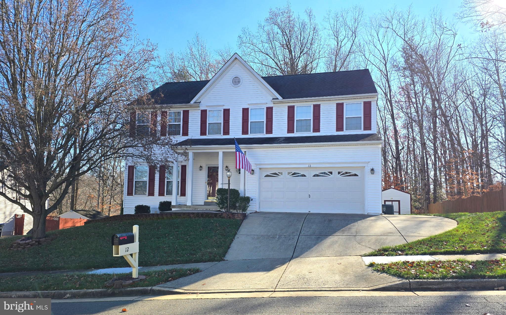 12 Bells Ridge Drive Stafford, VA 22554 - Photo 1 of 1 a front view of a house with a garden