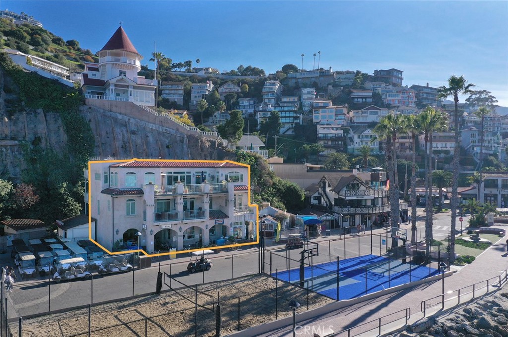 107 Pebbly Beach Road Avalon, CA 90704 - Photo 1 of 1 a view of city with tall buildings