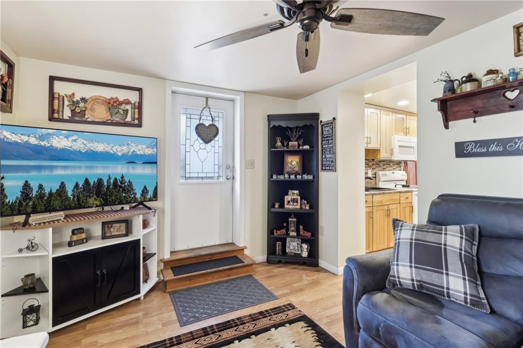 199 Latimer Avenue Strabane, PA 15363 - Photo 11 of 44 a living room with furniture and a flat screen tv