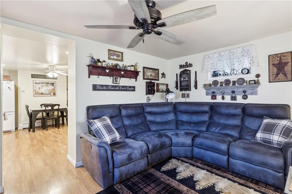 199 Latimer Avenue Strabane, PA 15363 - Photo 12 of 44 a living room with furniture and wooden floor