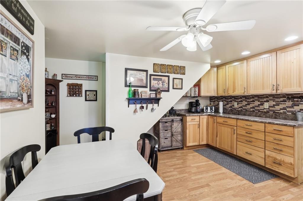 199 Latimer Avenue Strabane, PA 15363 - Photo 16 of 44 a very nice looking dining room with a chair and white walls