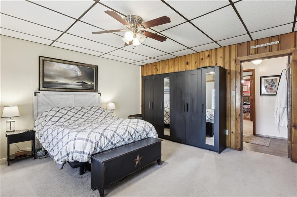 199 Latimer Avenue Strabane, PA 15363 - Photo 20 of 44 a bed sitting in a bedroom next to a bathroom