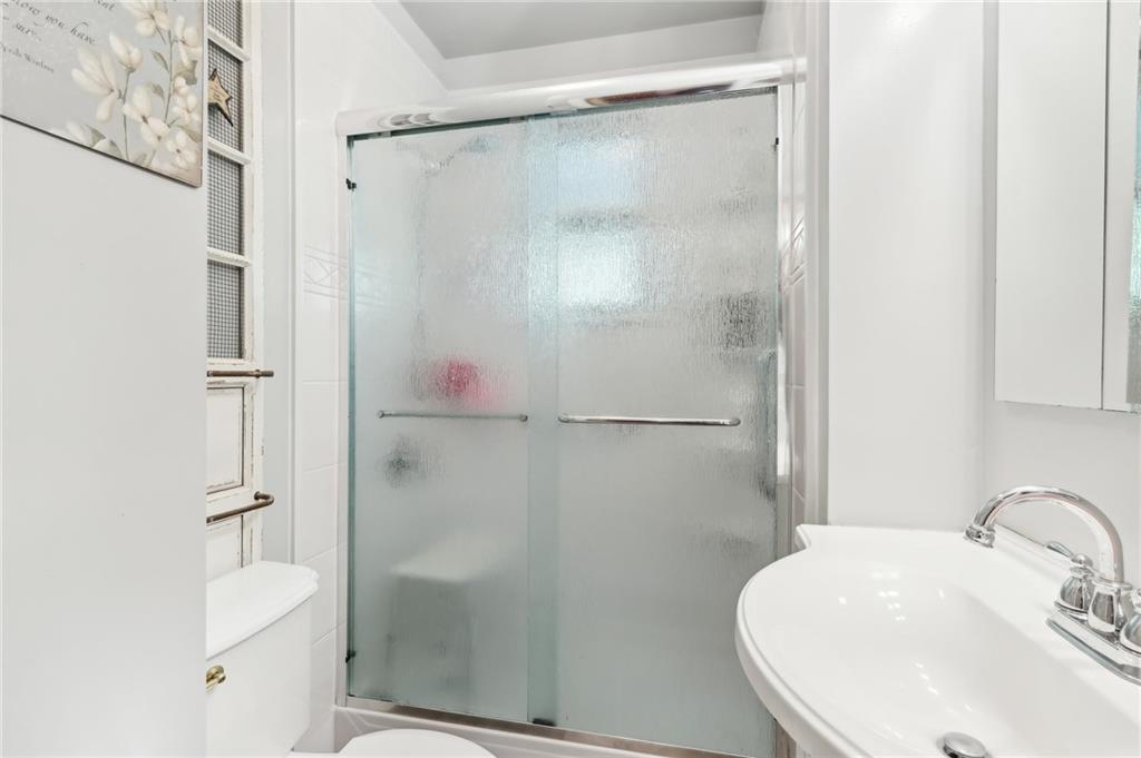 199 Latimer Avenue Strabane, PA 15363 - Photo 23 of 44 a bathroom with a sink and shower