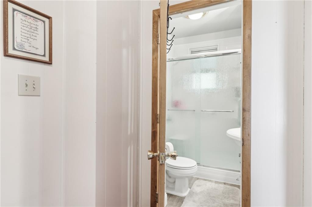 199 Latimer Avenue Strabane, PA 15363 - Photo 24 of 44 a white toilet sitting next to a bathroom sink