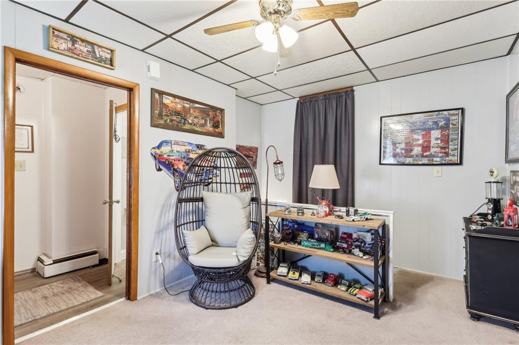 199 Latimer Avenue Strabane, PA 15363 - Photo 27 of 44 a bedroom with furniture and a fan