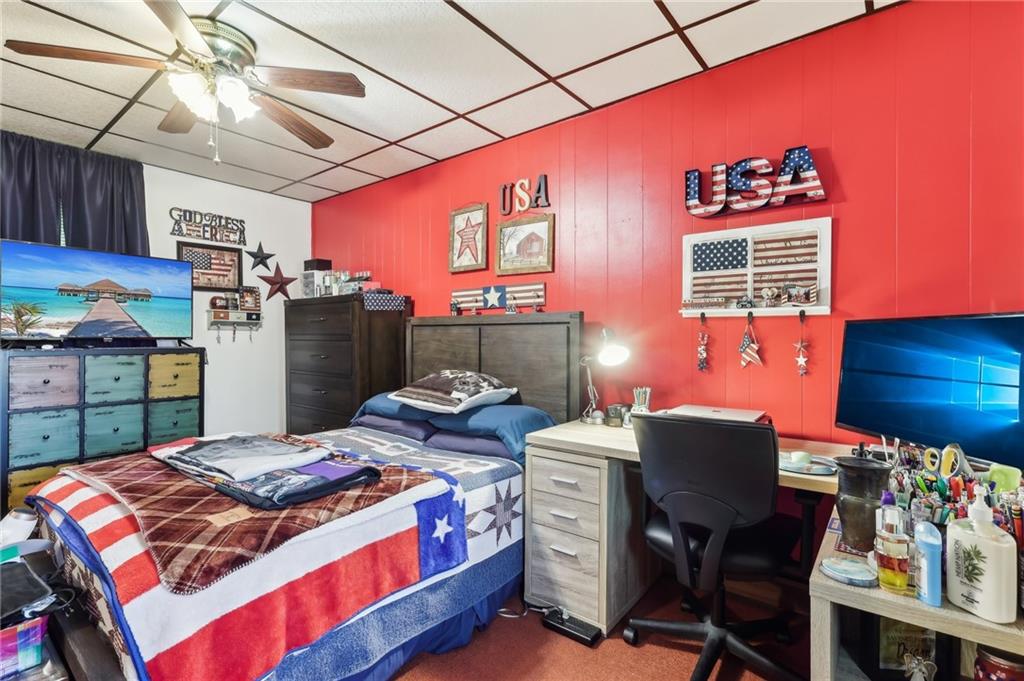 199 Latimer Avenue Strabane, PA 15363 - Photo 30 of 44 a bed room with a bed and a chair