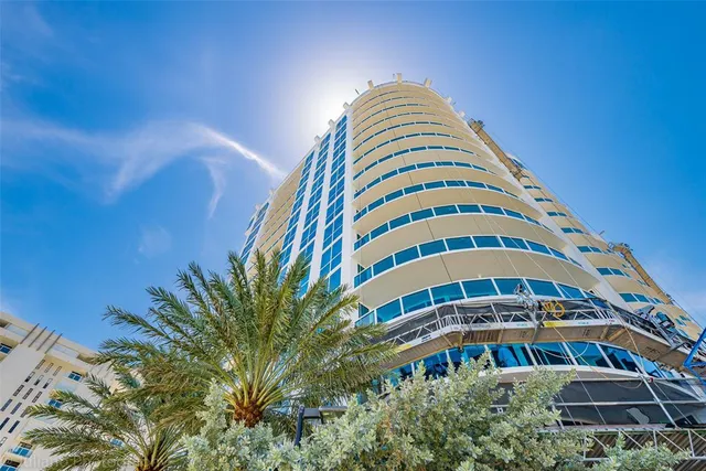 a view of a city with an ocean view