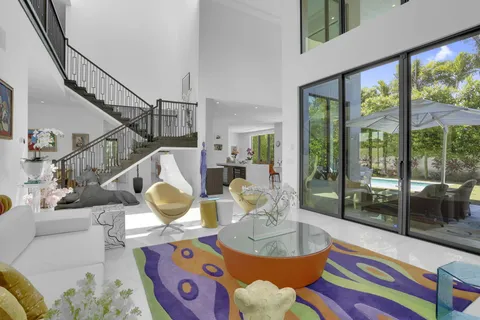 a view of swimming pool from a balcony