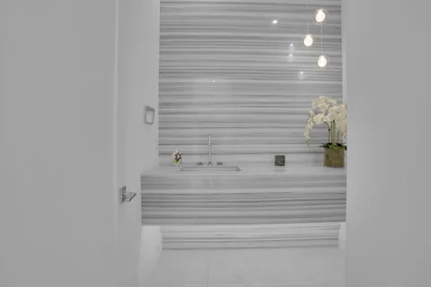 a view of living room with furniture and a flat tv screen