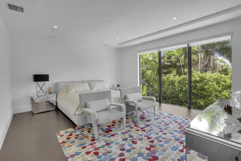 a view of a house with a yard and plants