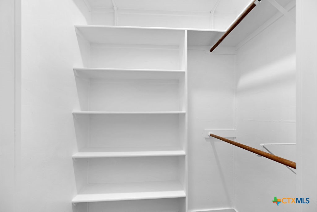 607 West 3rd Street Eddy, TX 76524 - Photo 15 of 29 a view of an empty walk in closet