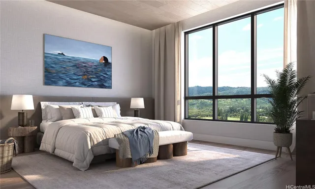 a bedroom with a bed and a large window