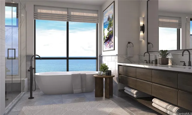 a bathroom with a bathtub and a sink