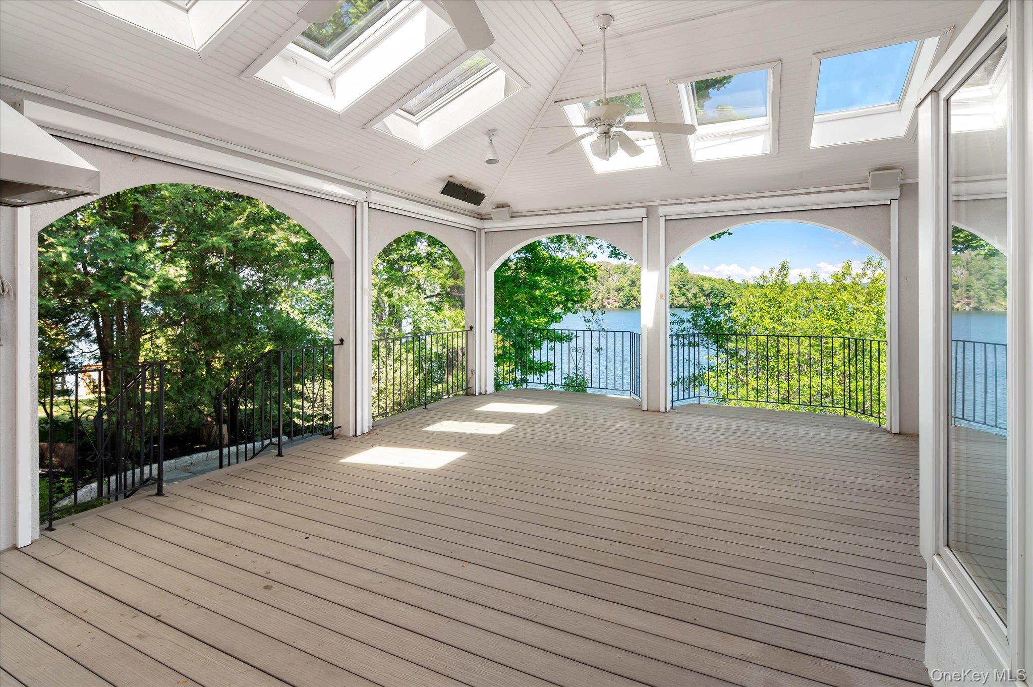 41 Tamarack Road Mahopac, NY 10541 - Photo 17 of 41 The indoor/outdoor living space on Lake Mahopac, where the screens vanish and the lake comes in