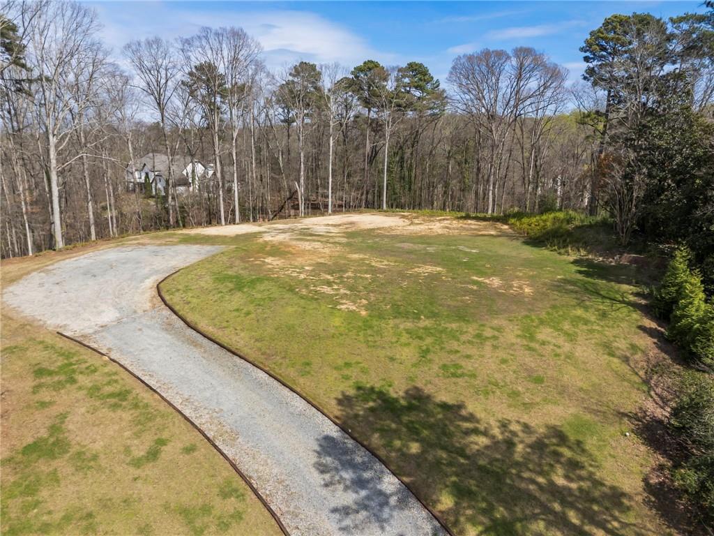4931 Rebel Trail Atlanta, GA 30327 - Photo 28 of 30 a swimming pool with trees in the background